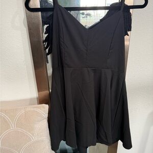 Elegant Black Dress with Wings